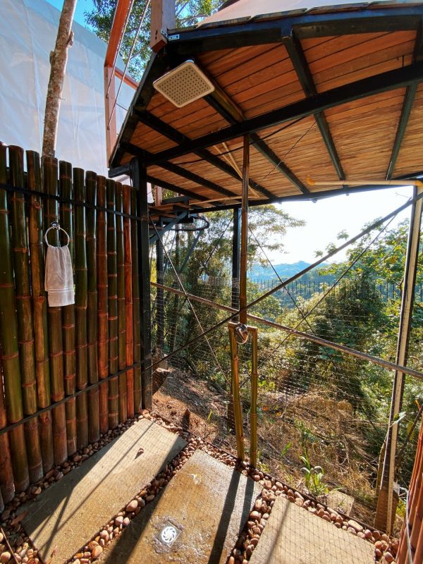 baño privado dream ikigai glamping vista bosque ducha